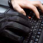 computer theft with hands on laptop keyboard 2021 08 26 22 35 11 utc