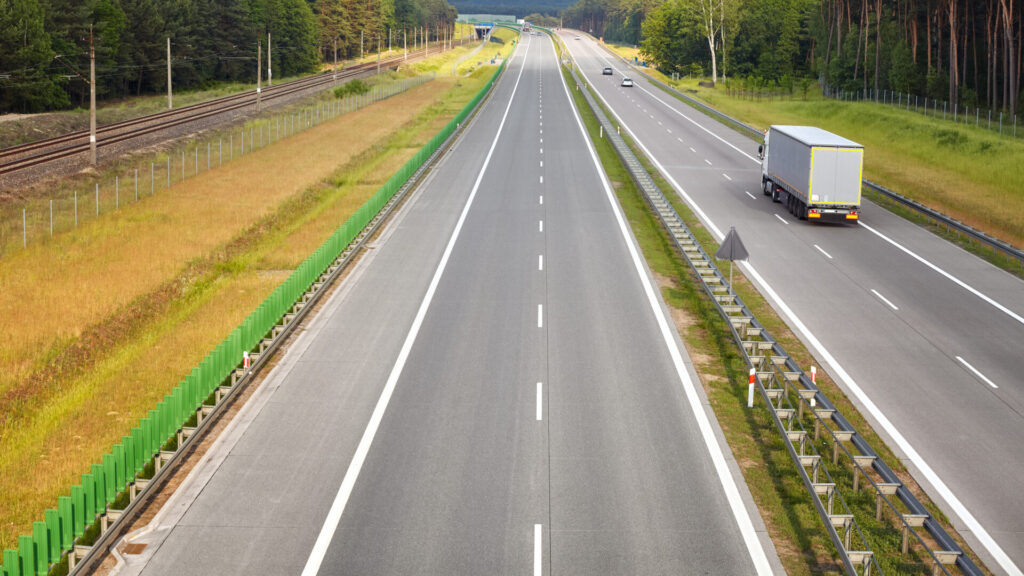 panoramic picture of a lorry on almost empty highw 2021 08 26 22 41 36 utc